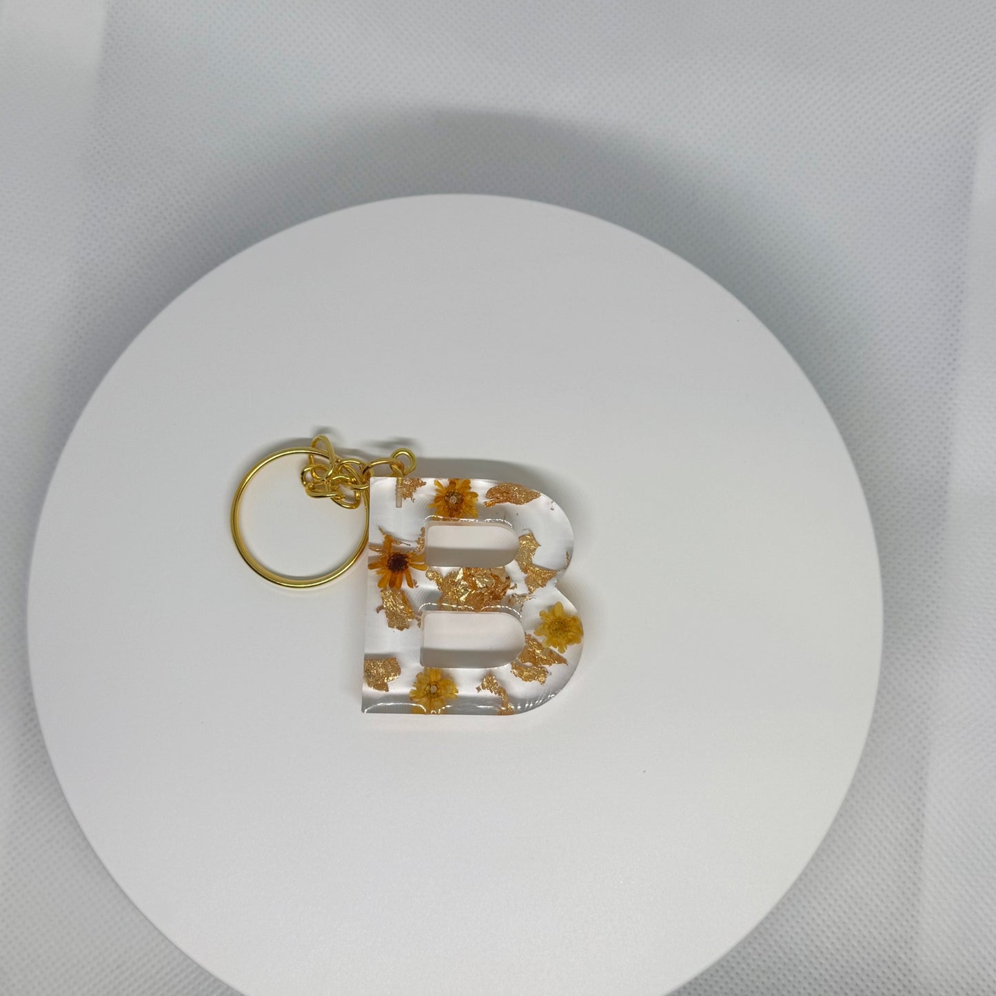 Alphabet letter keychain with flowers and gold